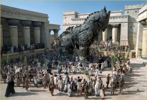 Troy's Citizens Praise & Worship Statue Of Horse, Not Knowing The Enemy Is Hidding Inside Waiting For The Dark Of Night To Open The City Gates.